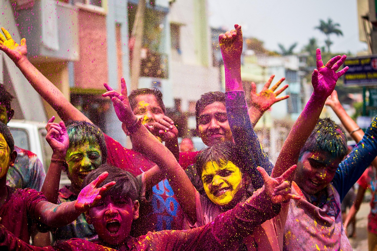 Children celebrating Holi with colored powder